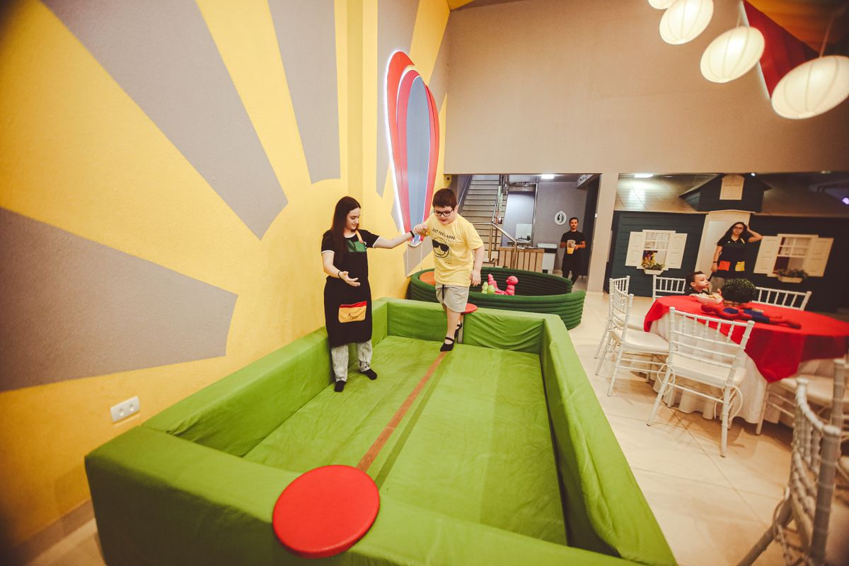 Child playing an imaginative superhero game