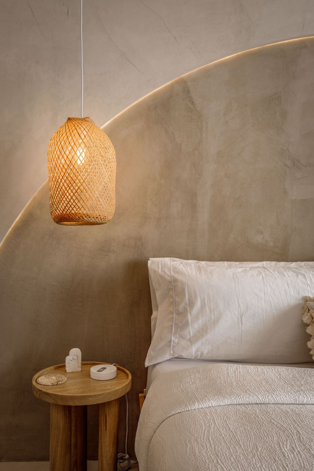 Calm, minimalist bedroom with soft lighting