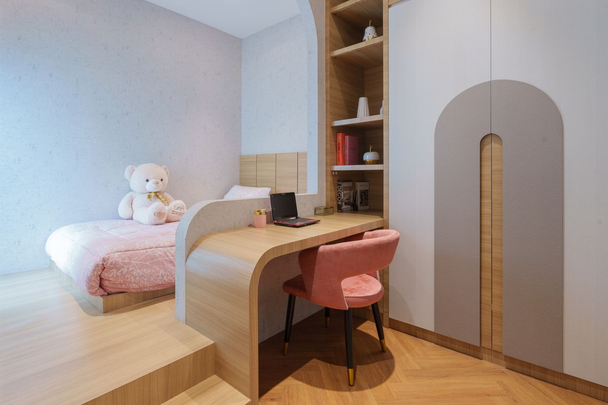 Cozy big-kid bedroom with a desk and teddy bear