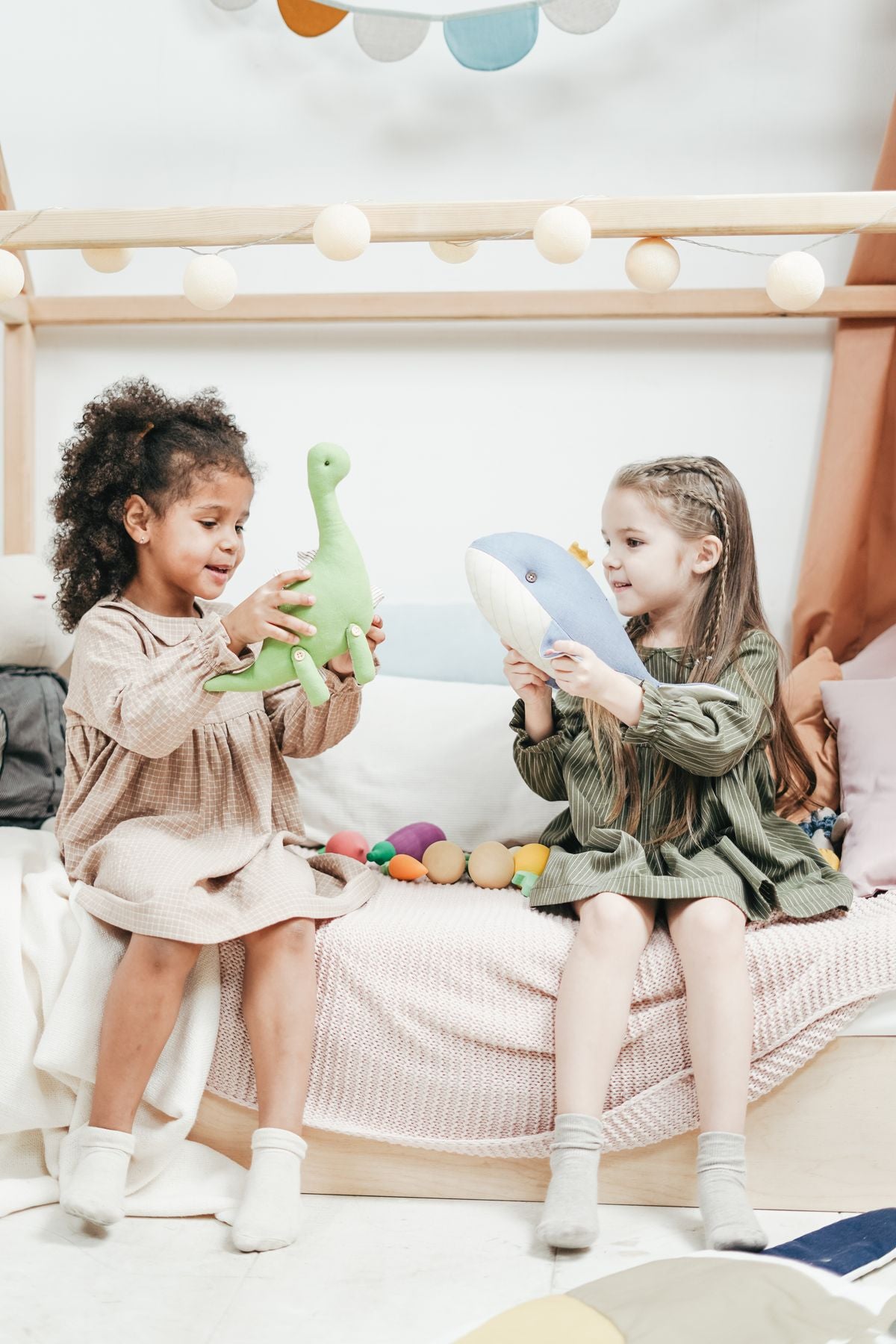 Children with their collection of stuffed animals
