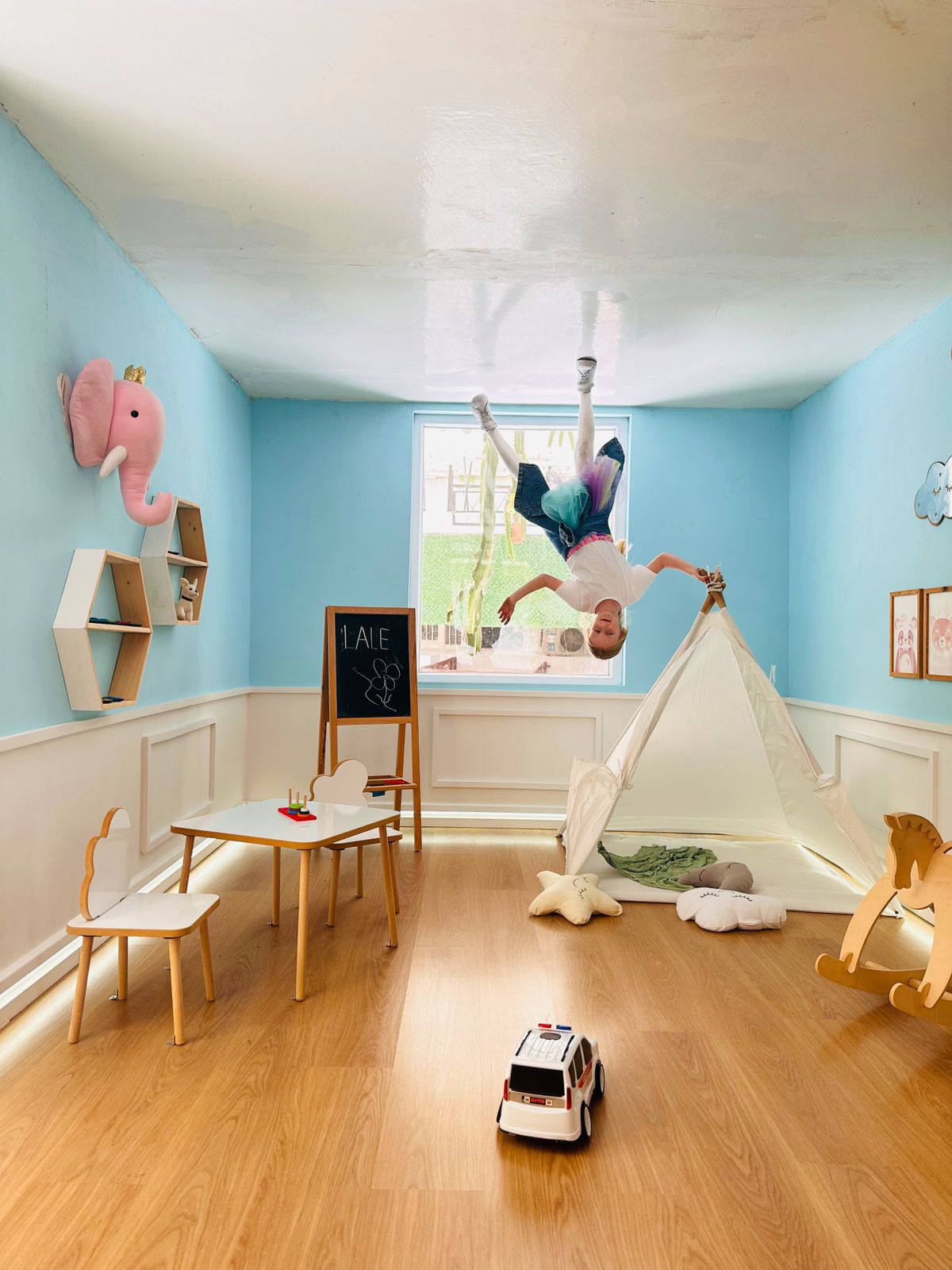 Boldly decorated feature wall in a kids room