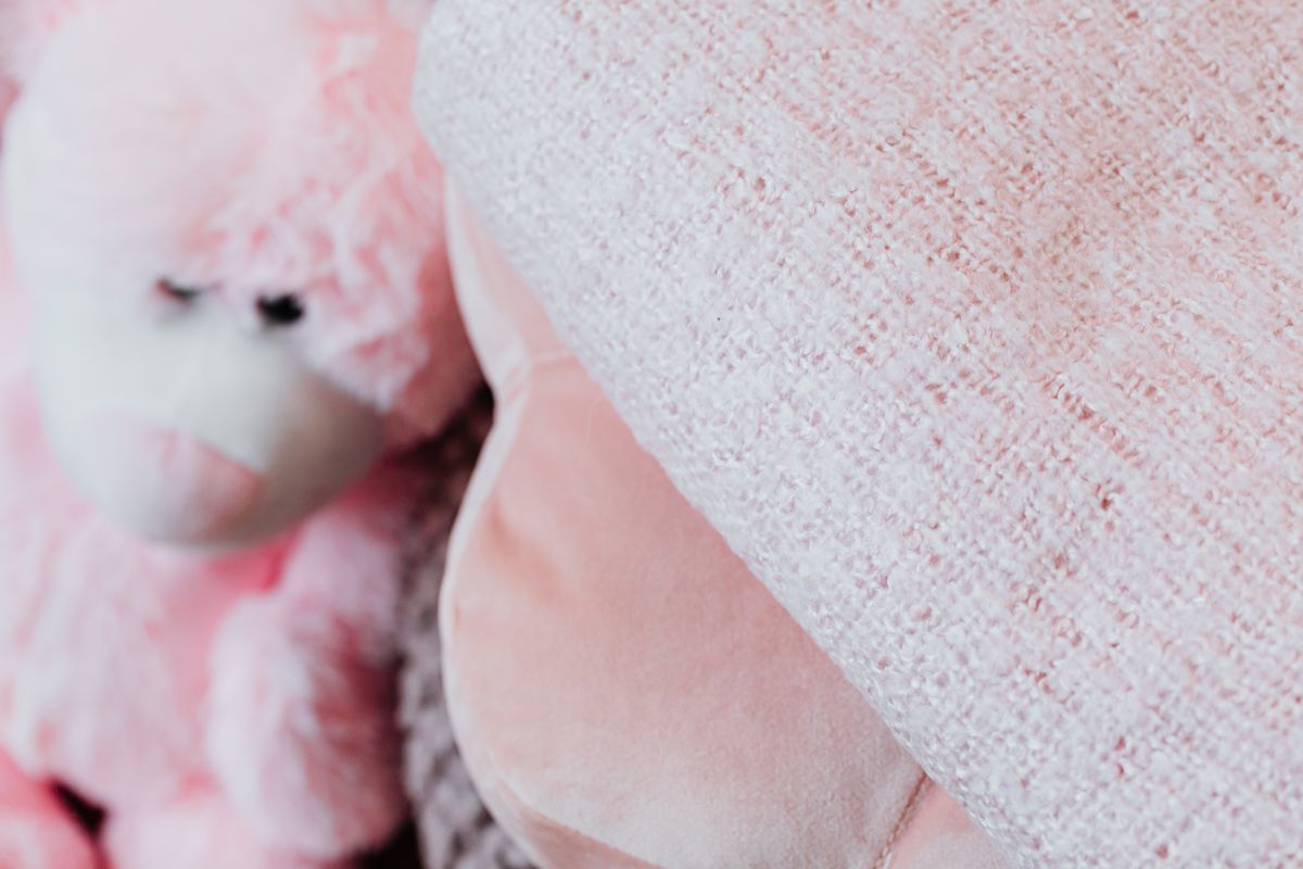 Soft, layered textiles in a cozy kids room