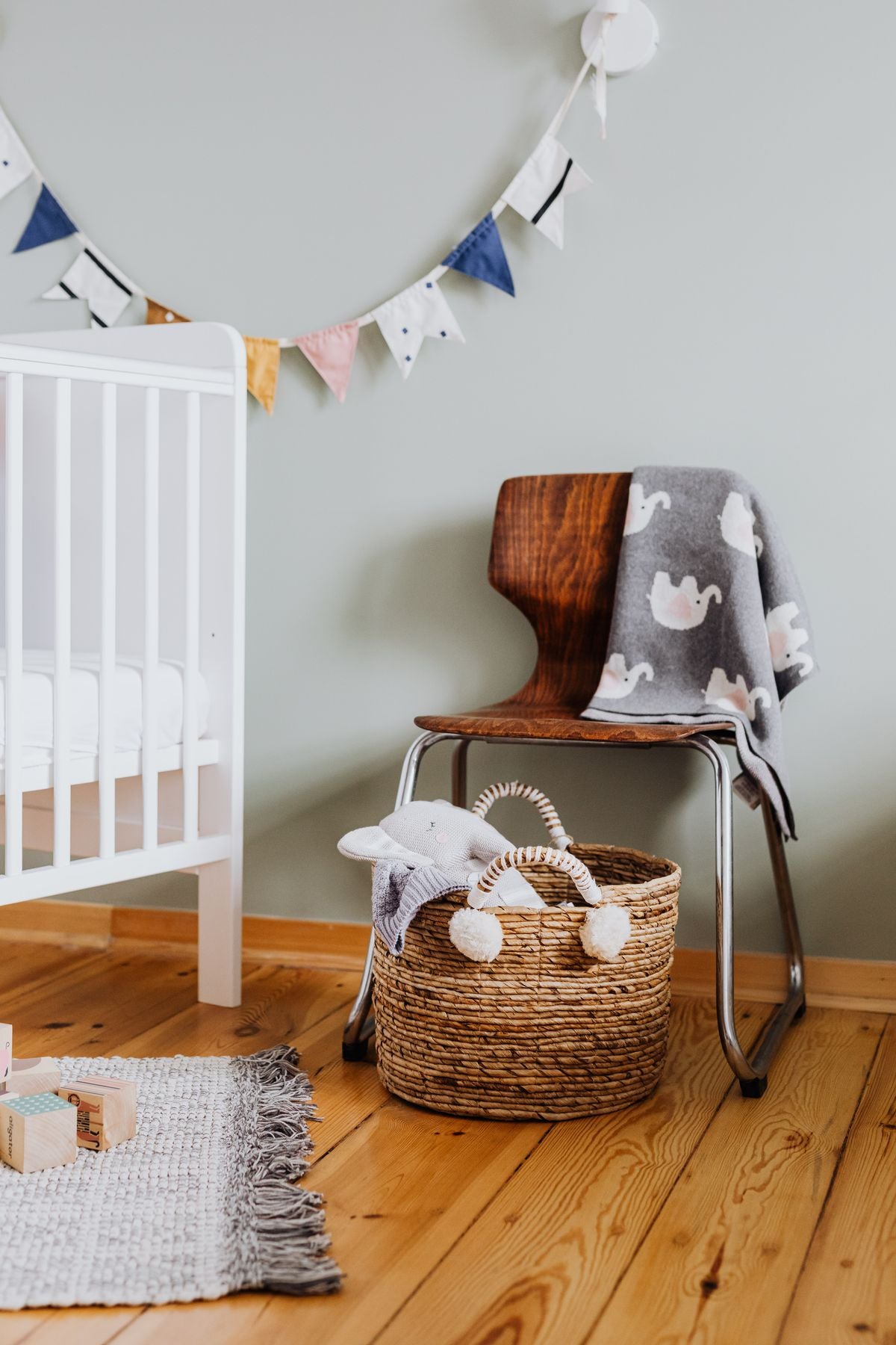 Plush elephant toy in a child's room with animal decor