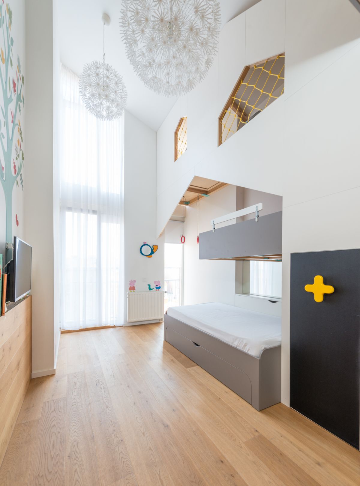 Creative kids bedroom with a wall of art