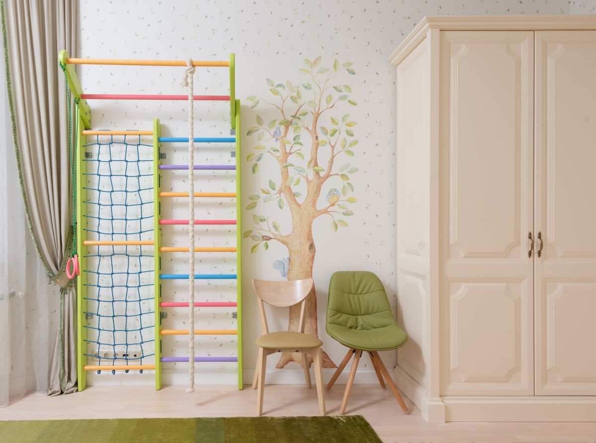Kids room wall with art at child height