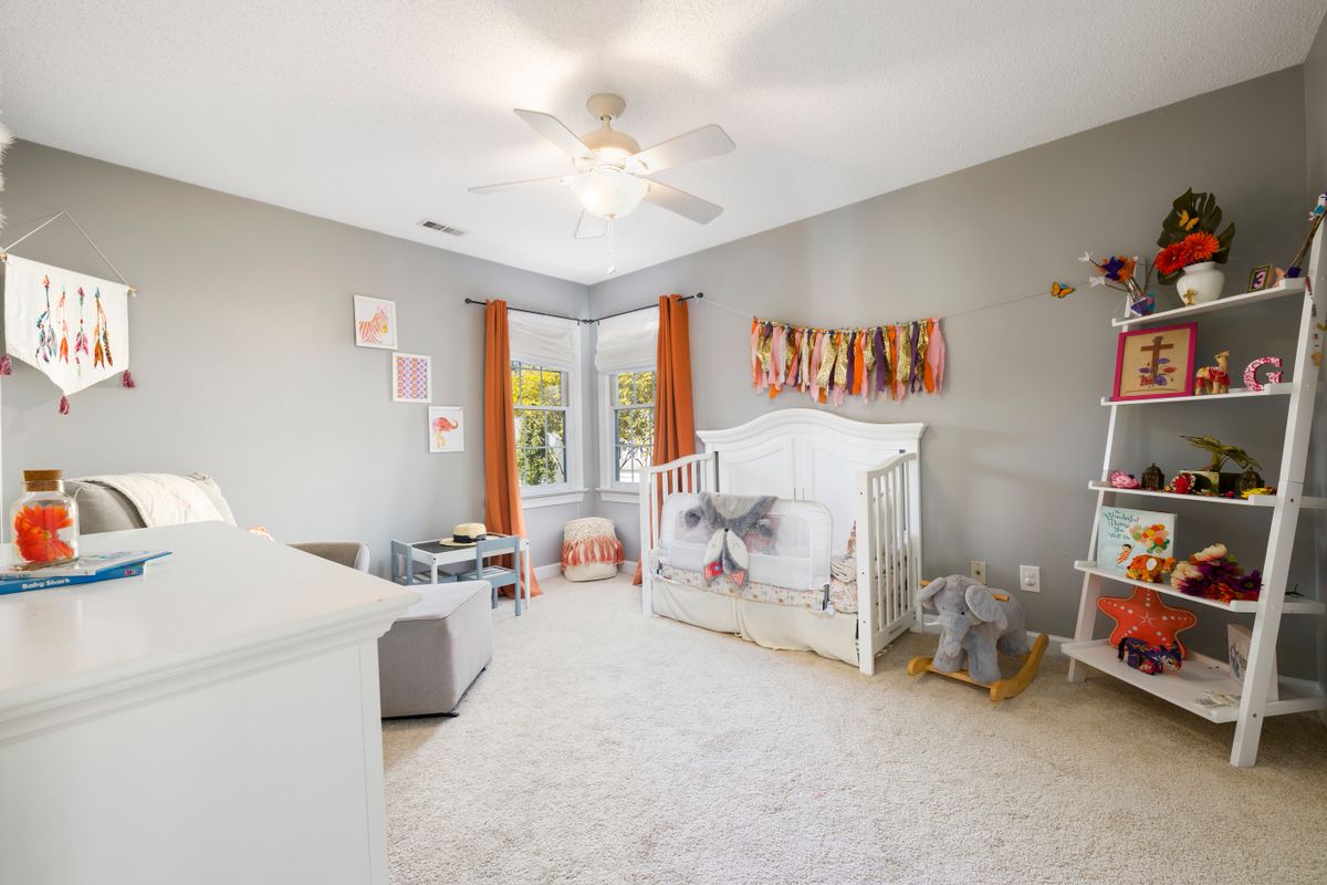 Kids room with a world map poster on the wall